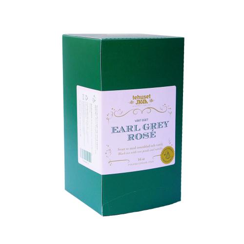 Grön låda med tepåsar av sorter Earl Grey rose