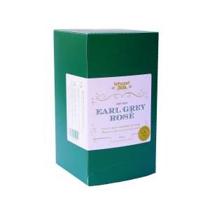 Grön låda med tepåsar av sorter Earl Grey rose