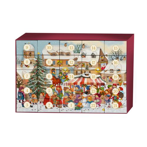 Adventskalender med bitar för att göra ett pussel med juligt motiv. Insidan av lådan