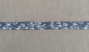 Textilband i blått med vitt tryckt växtmönster