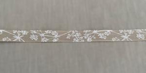 Textilband i linnefärg med vitt tryckt växtmönster