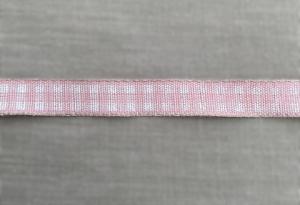 Textilband, melerad rosa med vitt tryckt rutmönster på ena sidan