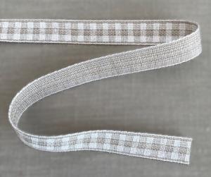 Textilband, melerat linnefärgat med vitt tryckt rutmönster på ena sidan