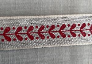 Textilband, linnefärgad med rött tryckt myrtenmönster, ståltrådskant