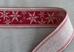Textilband, linnefärgat band, tryckta snöflingor på röd botten, röd vävd kant