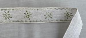 Textilband, linnefärgad med tryckta gröna snöflingor, ståltrådskant
