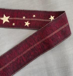 Textilband, melerad mörkröd med guldstjärnor och guldrand