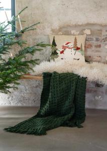 Kuddfodral ALPIN med broderad snögubbe som åker skidor