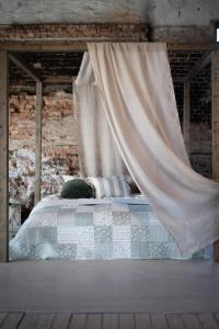 Dubbelöverkast VERDI i quiltat lapptäcksmönster i grönt