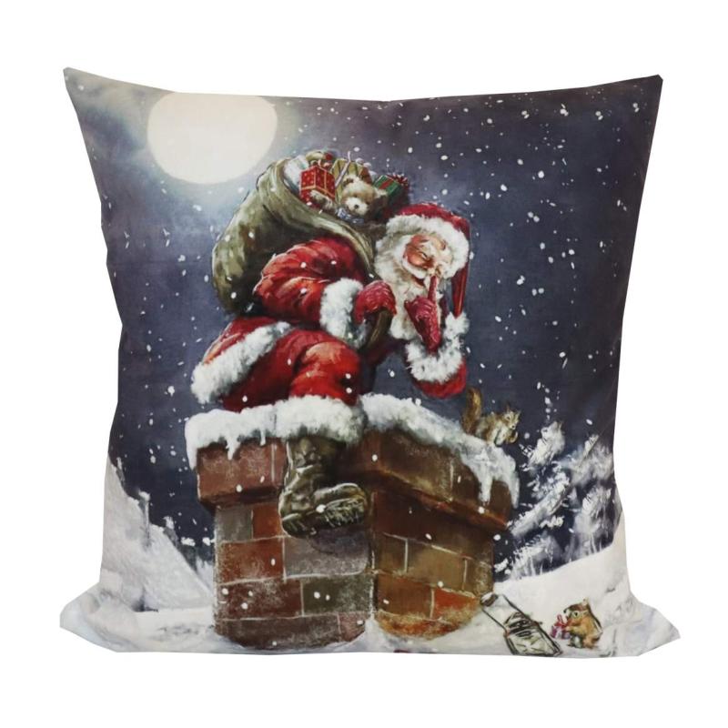 Kuddfodral X-MAS med en tomte på väg ner i skorstenen