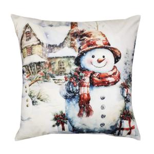Kuddfodral X-MAS SNOWMAN med en snögubbe i röd hatt framför ett hus