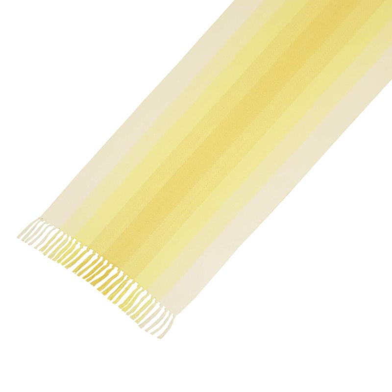 Bordslöpare HILMA med ränder som tonar ut från gult till vitt. Frans i kortsidorna.