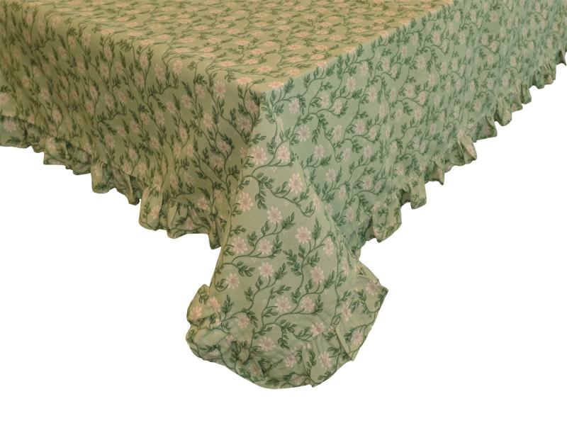 Duk FANNY med beige blommor och gröna blad på grön bottenfärg. Volang runt kanten.