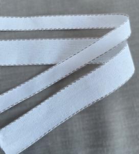 Textilband i två bredder, enfärgad antikvit med linnefärgad tråd i kanten