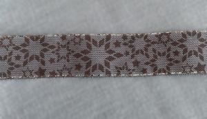 Textilband med snöflingor i brunt med guldtrådad kant