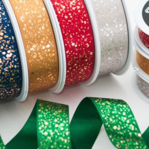 Textilband SPARKLER, gnistrande satinband i två bredder, guld