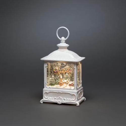 Vandfyldt Lille Lanterne Med Julemanden Flyver Over Landsbyen IP20 Antik Hvid Konstsmide