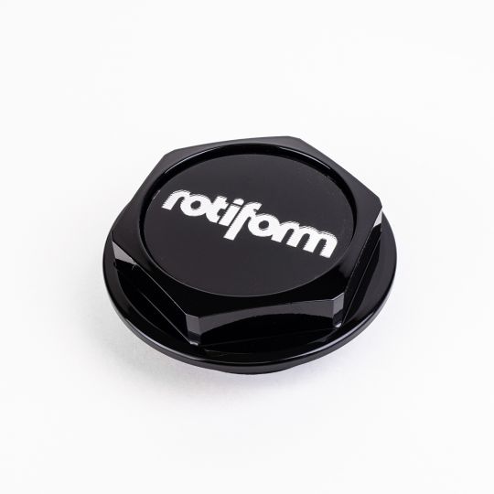 Rotiform hex cap