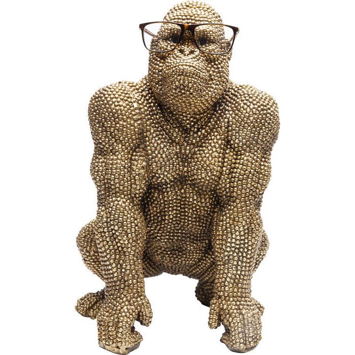 Skulptur Gorilla täckt med brons-guldig finish nitar.