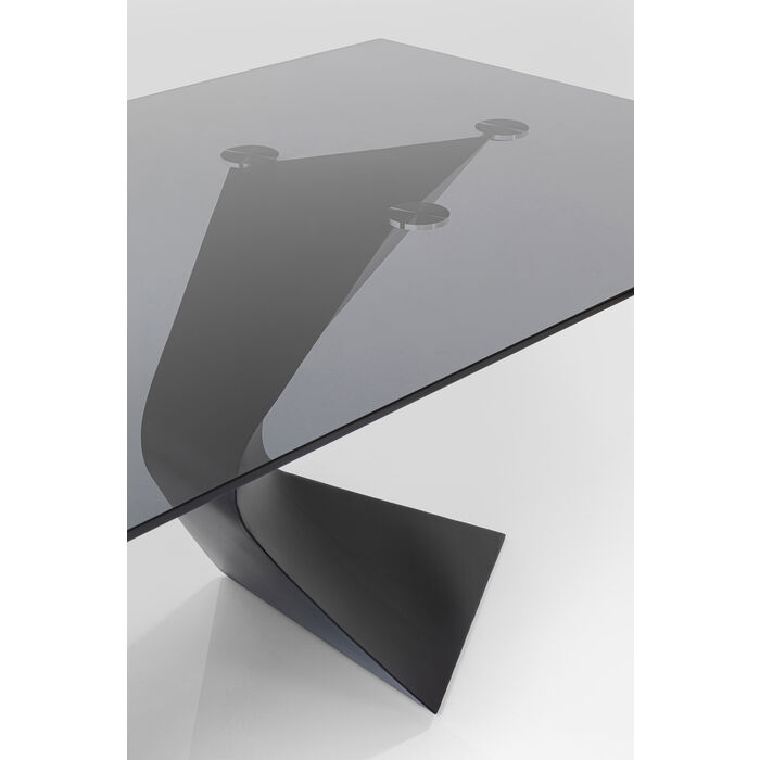 Elegant bord med en svart glasskiva och svart underrede