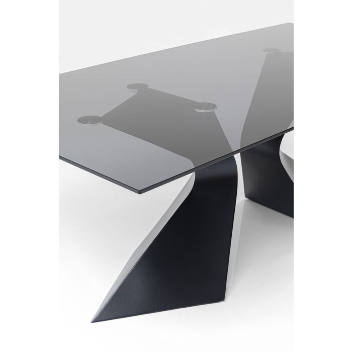 Stilrent matbord med glasskiva och svart underrede