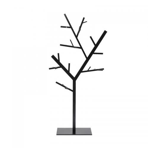 En stilren tamburmajor i grafiskt stilren design, matt svart lack.