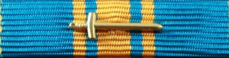 Försvarsmaktens förtjänstmedalj i guld med svärd 2010-