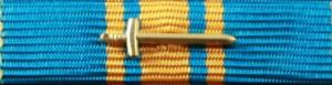 Försvarsmaktens förtjänstmedalj i guld med svärd 2010-