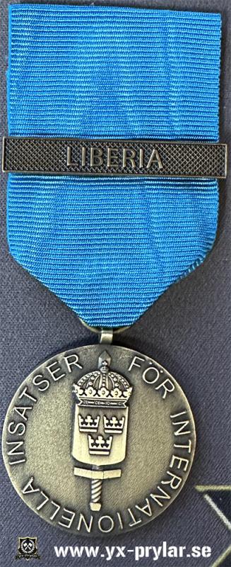 Försvarsmaktens medalj för internationella insatser i brons med bandspänne LIBERIA