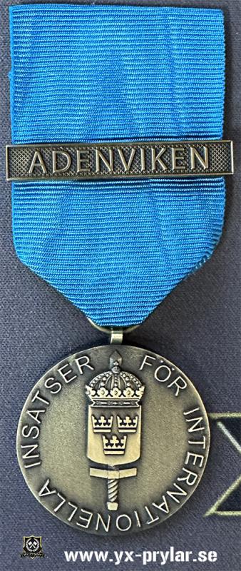 Försvarsmaktens medalj för internationella insatser i brons med bandspänne ADENVIKEN