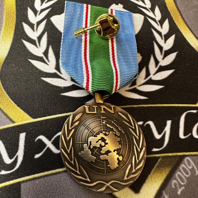 UNIFIL medalj med "yx-pin"