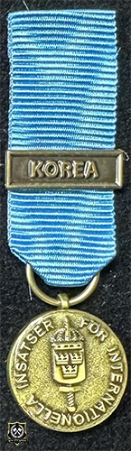 Försvarsmaktens medalj för internationella insatser i brons med bandspänne -KOREA-