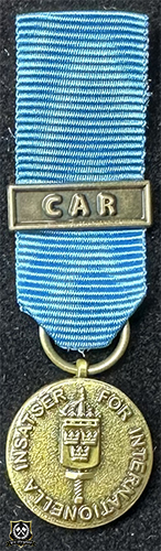 Försvarsmaktens medalj för internationella insatser i brons med bandspänne -C  A  R-
