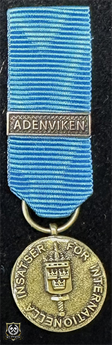 Försvarsmaktens medalj för internationella insatser i brons med bandspänne -ADENVIKEN-