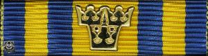Försvarsmaktens tjänstgöringsmedalj för rikets försvar i guld med tre kronor