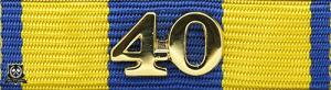 Släpspänne "Hemvärnets tjänstgöringsmedalj för 40 tjänsteår"