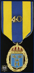 Hemvärnets tjänstgöringsmedalj i guld och emalj med parmonterad siffra för 40 tjänsteår