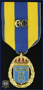 Hemvärnets tjänstgöringsmedalj i guld och emalj med parmonterad siffra för 60 tjänsteår
